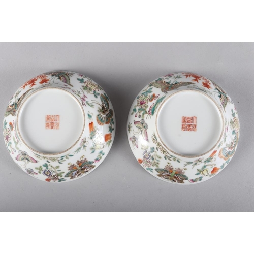 106 - A pair of Chinese porcelain famille verte bowls, decorated with butterflies and flowers, seal mark t... 