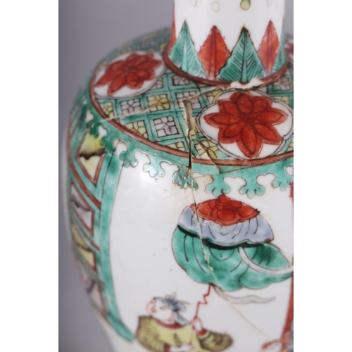 108 - A pair of Chinese porcelain famille verte baluster vases, decorated figures, 10 1/2