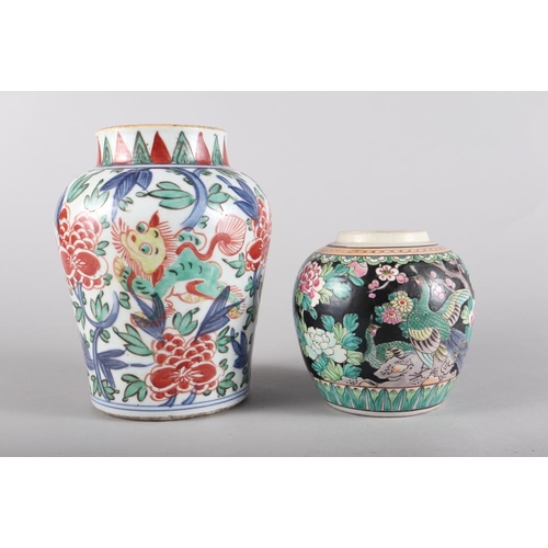 109 - A Chinese porcelain baluster famille verte decorated vase, a Chinese famille noire ginger jar and ot... 