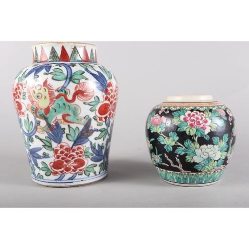 109 - A Chinese porcelain baluster famille verte decorated vase, a Chinese famille noire ginger jar and ot... 