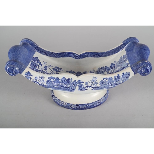 14 - A 19th century blue and white transfer decorated cheese trough and a blue and white tureen and cover... 