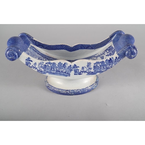 14 - A 19th century blue and white transfer decorated cheese trough and a blue and white tureen and cover... 