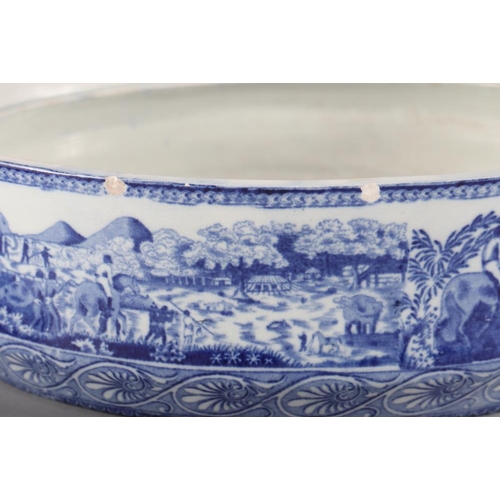 14 - A 19th century blue and white transfer decorated cheese trough and a blue and white tureen and cover... 