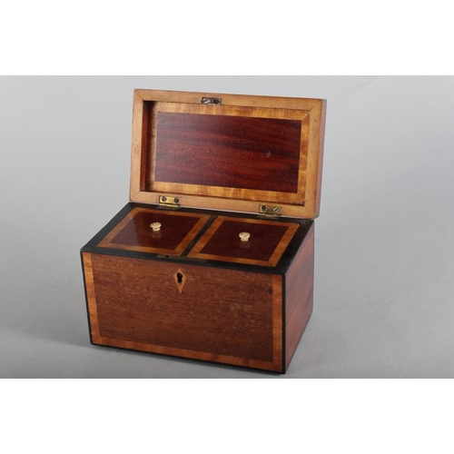 158 - A mahogany and banded rectangular tea caddy, 7