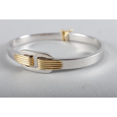 273 - An Italian 18ct white gold bangle with yellow gold details, 15.6g