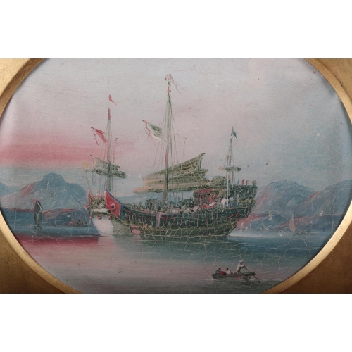 327 - A 19th century oval watercolour, view of Hong Kong harbour with junk in foreground, label verso 