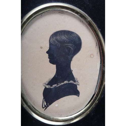 329 - Two 19th century portrait miniatures of gentlemen, in ebonised frames, and a pair of silhouette port... 