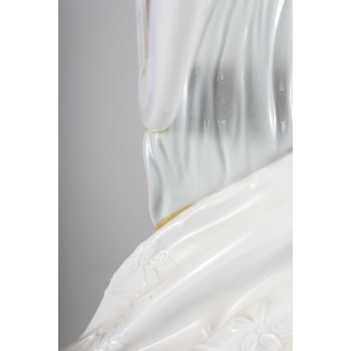 34 - A Lladro porcelain figure, 