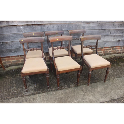 368 - A set of six Regency mahogany standard chairs with carved back rails, on inverted tulip carved suppo... 