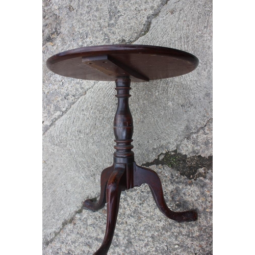 370 - A 19th century mahogany framed long footstool, upholstered in a red velvet, and a circular mahogany ... 