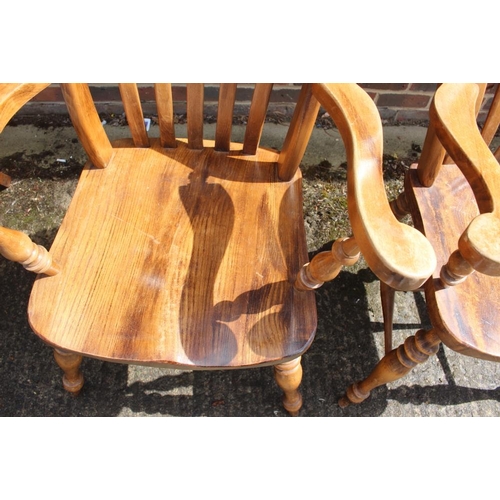 371 - A pair of 19th century Windsor lath back kitchen armchairs