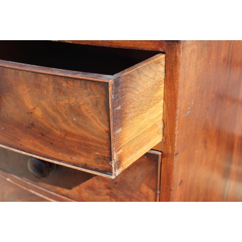 377 - An early 19th century bowfront mahogany chest of two short and three long drawers, 42