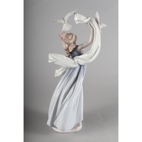 38 - A Lladro porcelain figure, 