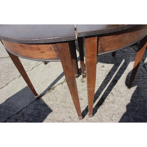 380 - A 19th century mahogany and ebony strung two-section extending dining table with two extra leaves, o... 