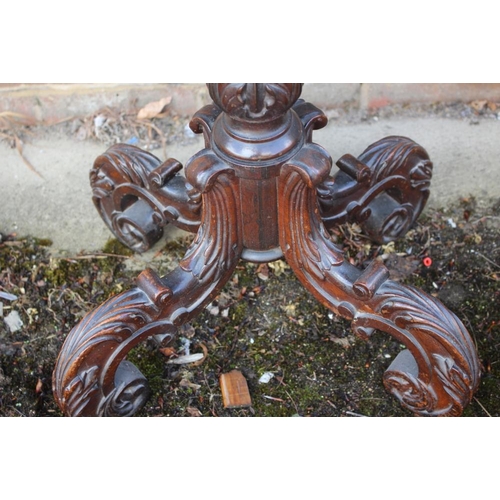 398 - A 19th century carved rosewood occasional table, on turned column and quadruple acanthus scroll supp... 