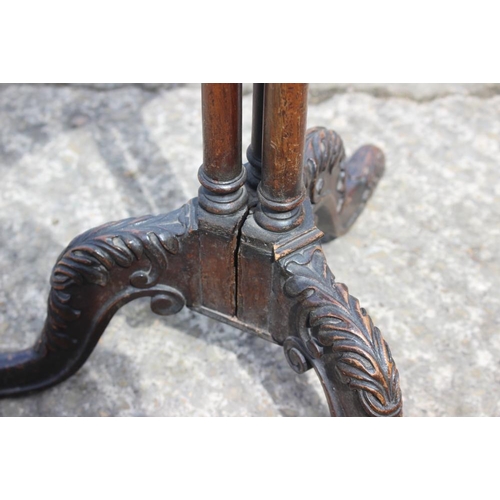 405 - A 19th century carved rosewood shape top occasional table, on cluster column and tripod splay suppor... 