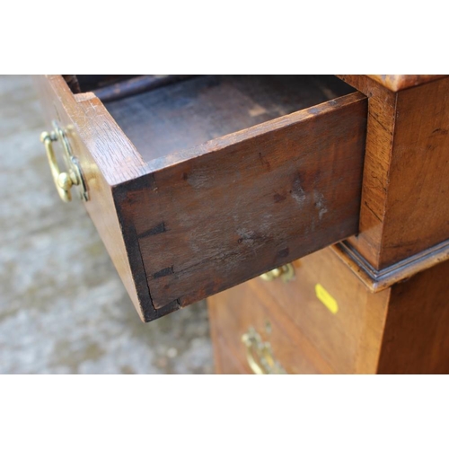 469 - An early 20th century walnut double pedestal desk with green leather tooled lined top over nine draw... 