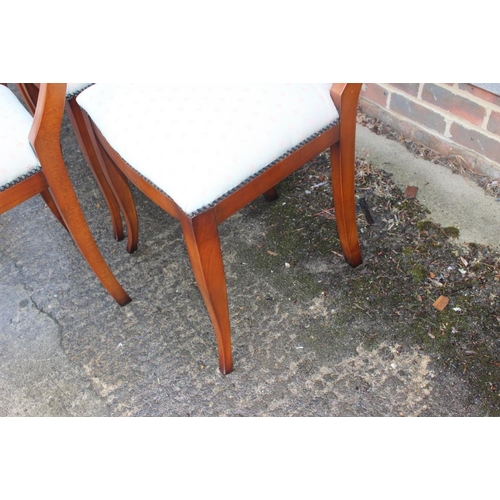 484 - A set of six carved cherrywood standard dining chairs with pierced splat backs and stuffed over seat... 