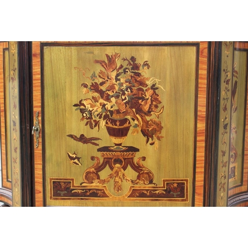 494 - An Italian marquetry marble top shape front credenza with bud and flower panels, on turned supports,... 