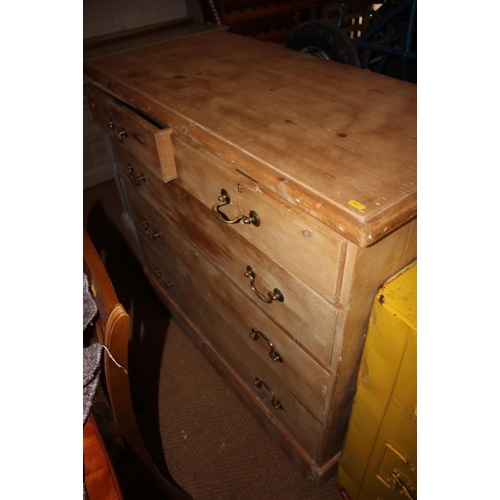 497 - A waxed pine chest of three small and four large drawers, on block base, 51