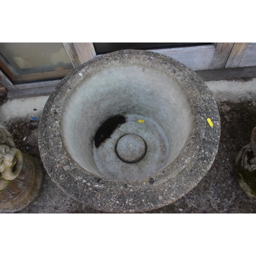 532 - A set of three cast stone pedestal planters with lion mask and ring decoration, 21