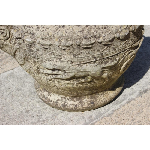 533 - A cast stone planter, decorated chariots, 16