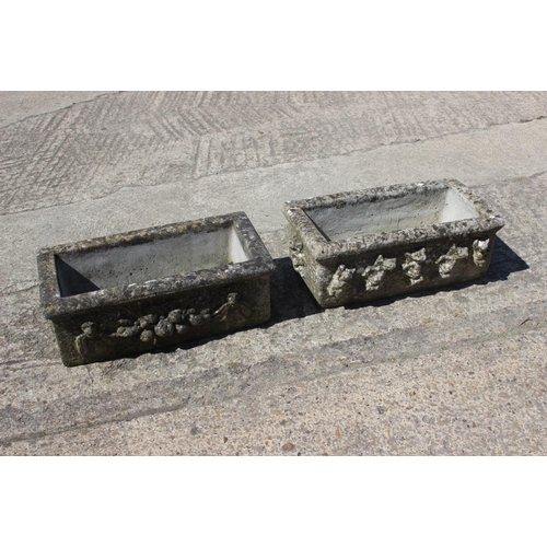 535 - A cast stone rectangular planter with swag decoration, 23