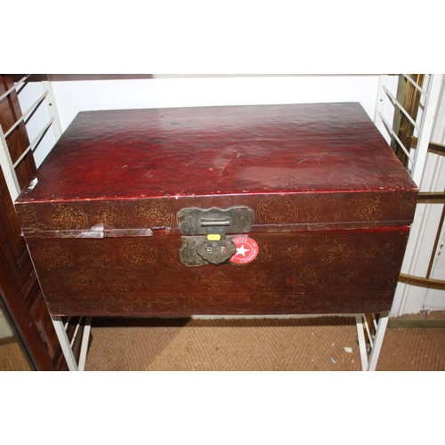 538 - A leather trunk, fitted brass lock, and a metal bound wooden trunk, stencilled Hunnings, 37