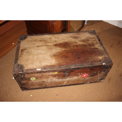 538 - A leather trunk, fitted brass lock, and a metal bound wooden trunk, stencilled Hunnings, 37