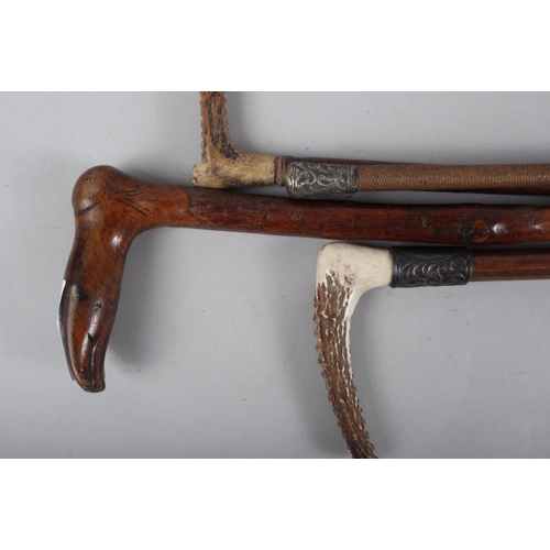 162 - A blackthorn walking stick, the handle formed as a foot, 31 1/2