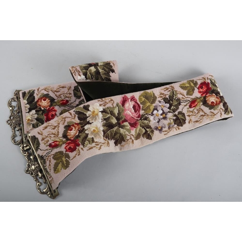 183 - A floral tapestry bell pull and a green and white cushion with tassel decoration