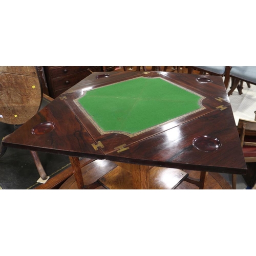 362 - An Edwardian rosewood and inlaid envelope card table, on square taper supports united by an undertie... 