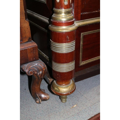 376 - A Napoleon III mahogany cupboard with shaped top, single door inset bevelled mirror enclosed hanging... 