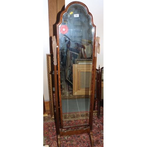 448 - A cheval dressing mirror with shaped top