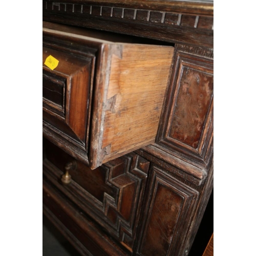 453 - A Jacobean style oak chest of two short and one long drawer with fielded fronts, on turned supports ... 