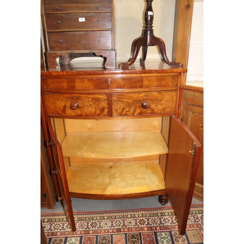 459 - A mahogany bowfront linen chest, fitted three drawers over cupboards enclosed faux drawer fronts, on... 