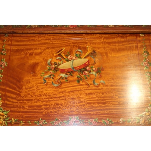 487 - A late 19th century satinwood nest of three tables, tops painted central cherub panel and floral bor... 