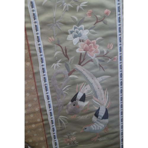 179 - A Japanese silk panel, embroidered birds, 29