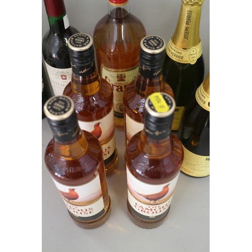 193 - Nine bottles of Joseph Perrier Brut Champagne, three bottles of Famous Grouse whisky, a bottle of 19... 