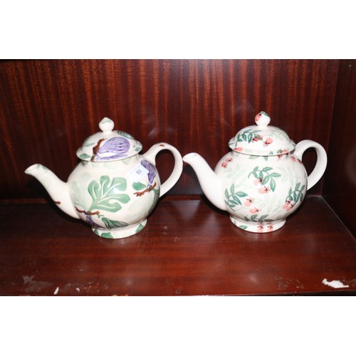 80 - Four Emma Bridgewater teapots, an Emma Bridgewater cow creamer and other similar china