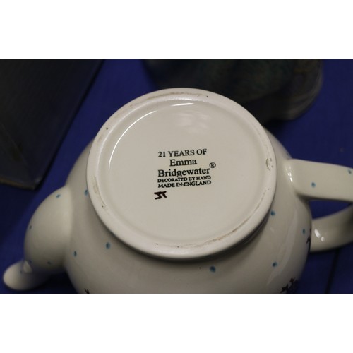 80 - Four Emma Bridgewater teapots, an Emma Bridgewater cow creamer and other similar china