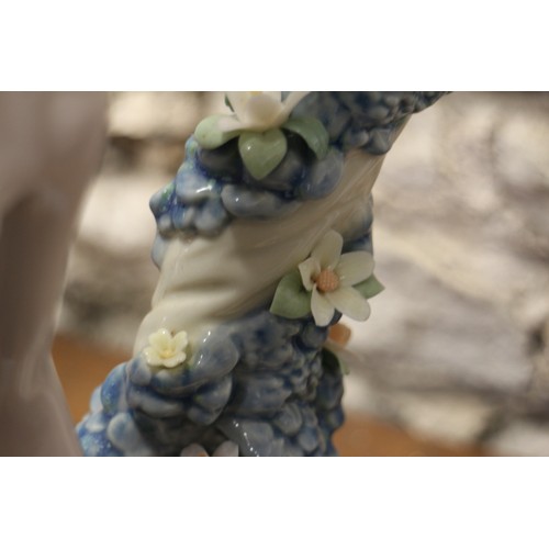 37 - A Lladro porcelain figure, 