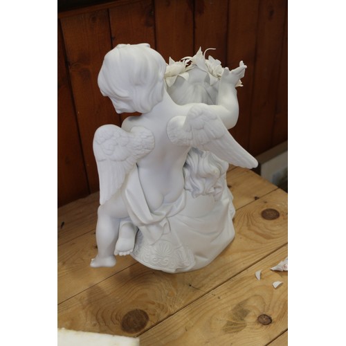 35 - A Lladro porcelain bust of a woman and child, 