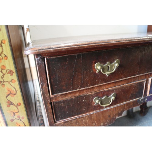 378 - An 18th century crossbanded mahogany lowboy, fitted three drawers, 30