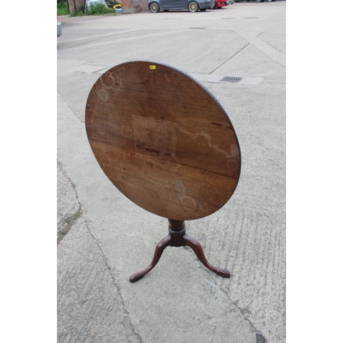 543 - An 18th century mahogany circular occasional table, on tripod base, 30