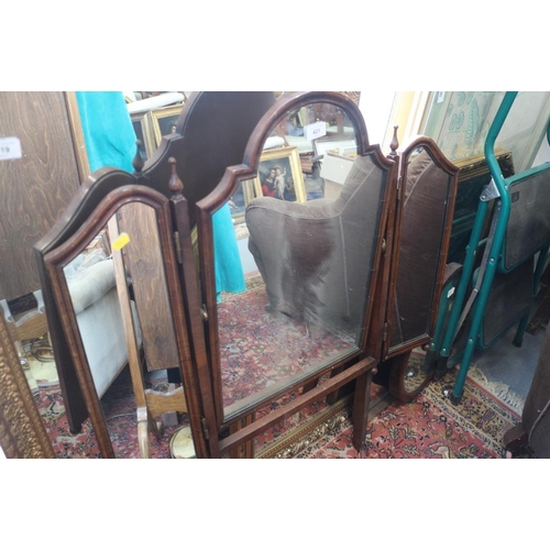 653 - A mahogany arch top triple-plate dressing table mirror
COLLECT