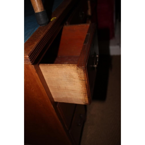 624 - A burr maple double pedestal desk with blue tooled lined top over seven drawers, on bracket feet, 40... 