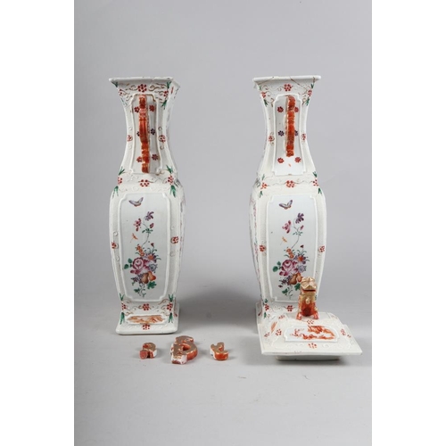 137 - A pair of Chinese porcelain polychrome enamel decorated two-handled rectangular section vases with b... 