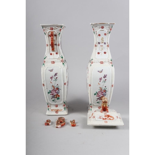 137 - A pair of Chinese porcelain polychrome enamel decorated two-handled rectangular section vases with b... 