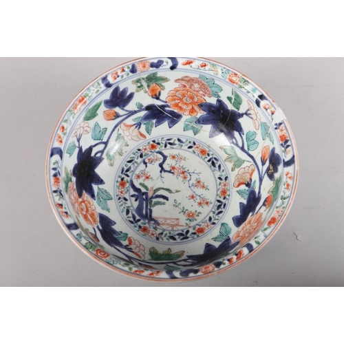 140 - An Imari decorated deep bowl, 11